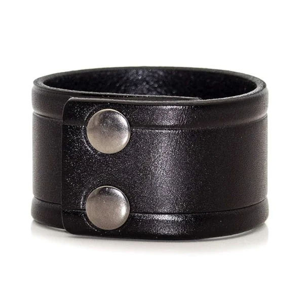 Bracelet Large en Similicuir Noir à Rainures Latérales avec fermoir boutons pression Bracelet Large en Similicuir Noir à Rainures Latérales avec fermoir boutons pression.