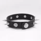 Bracelet Punk Rock Noir à Pointes Métal avec fermeture boutons pression.