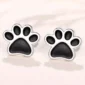 Clous d’Oreilles Empreinte de Chien en Acier.