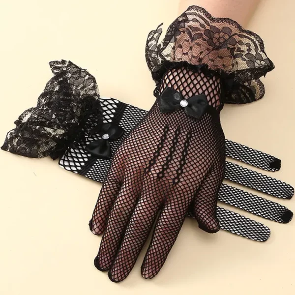 Gants Femme en Dentelle Noire avec Nœud Papillon et Strass (avec et sans main) Gants Femme en Dentelle Noire avec Nœud Papillon et Strass (avec et sans main).
