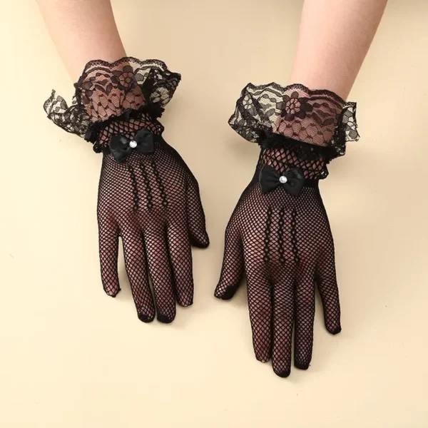 Gants Femme en Dentelle Noire avec Nœud Papillon et Strass (expo) Gants Femme en Dentelle Noire avec Nœud Papillon et Strass (expo).