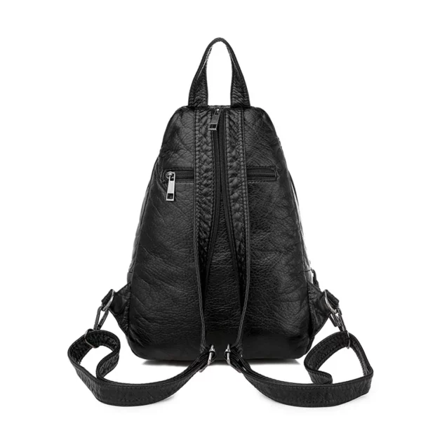 Sac à Dos Compact Femme en Cuir Noir Capitonné Port en Bandoulière ou Dorsal Sac à Dos Compact Femme en Cuir Noir Capitonné Port en Bandoulière ou Dorsal.