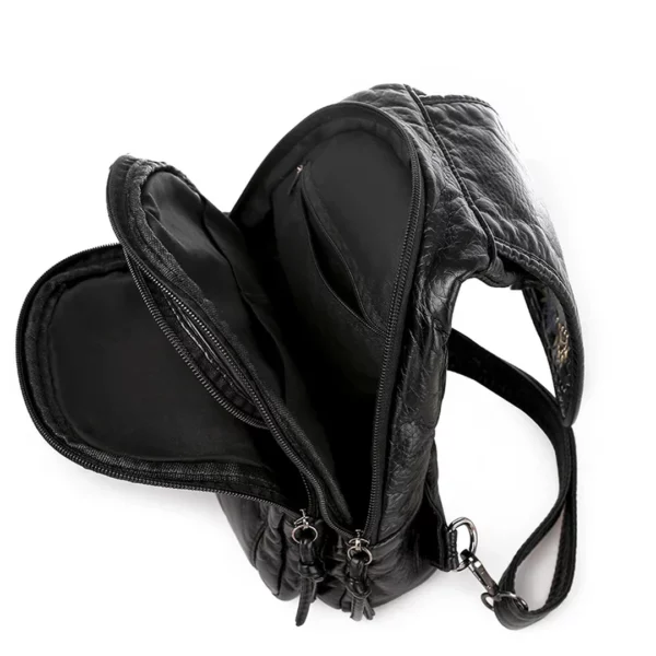 Sac à Dos Compact Multiple Rangements pour Femme en Cuir Noir Capitonné Sac à Dos Compact Multiple Rangements pour Femme en Cuir Noir Capitonné.