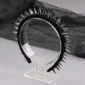 Serre-Tête en Tissu Noir Clouté.