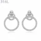 Boucles d'Oreilles Double Cercle Flottant Pavé Zirconiums.