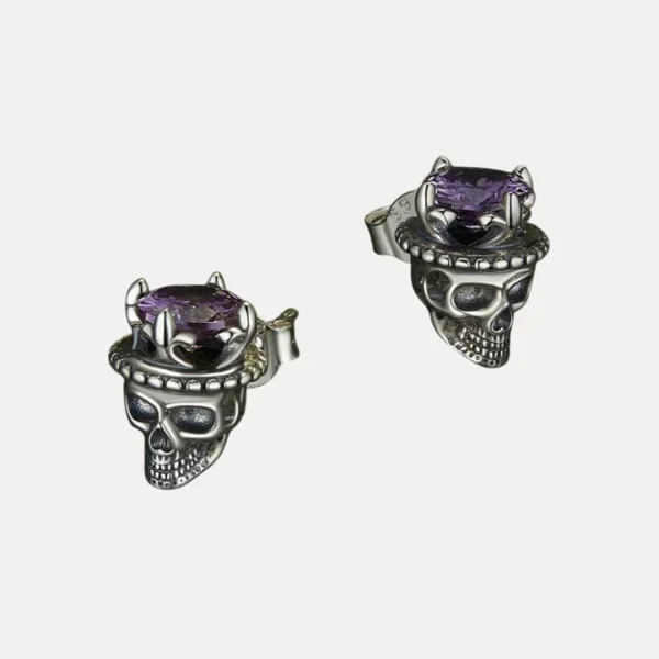 Boucles d’oreilles Tête de Mort en Argent 925 Couronne & Zircon Améthyste Boucles d’oreilles Tête de Mort en Argent 925 Couronne & Zircon Améthyste.