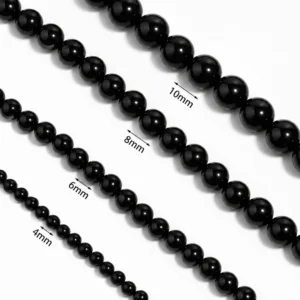 Collier de Perles Noires Nacrées sur Câble Acier 316L (diamètre des perles).