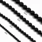 Collier de Perles Noires Nacrées sur Câble Acier 316L (diamètre des perles).