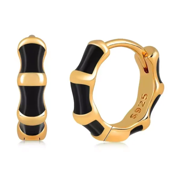 Créoles Argent 925 Doré à Segments Noirs Rhodiés Créoles Argent 925 Doré à Segments Noirs Rhodiés.