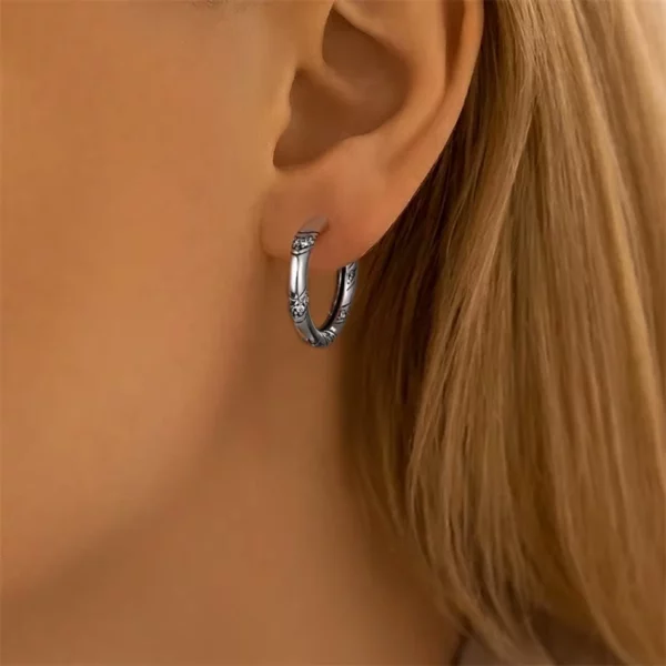 Créoles Symphonie Argentée (sur lobe) Créoles Symphonie Argentée (sur lobe).