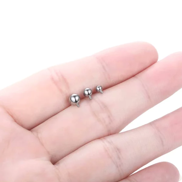 Embout Piercing Bille en Titane ASTM-F136 avec Pas de Vis 0.9mm Embout Piercing Bille en Titane ASTM-F136 avec Pas de Vis 0.9mm.