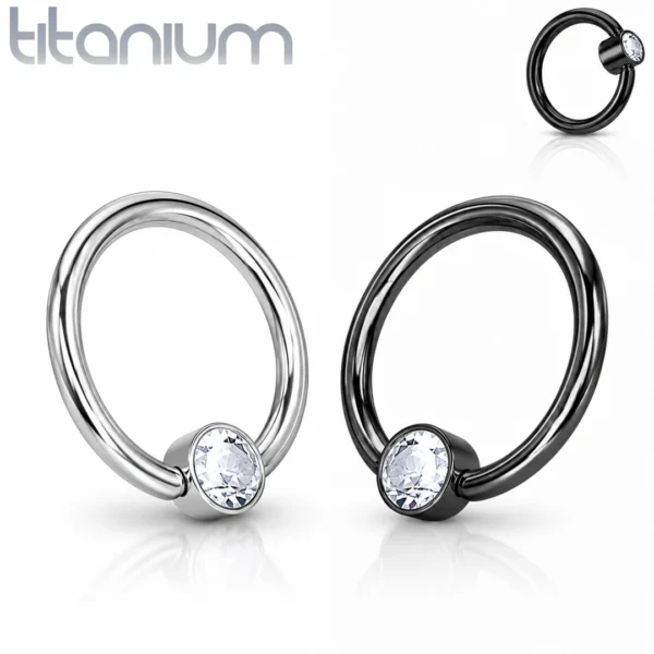 Piercing Anneau CBR Titane à Zirconium Serti Clos Piercing Anneau CBR Titane à Zirconium Serti Clos.