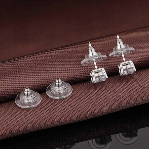 Bouchons de Boucles d’Oreilles en Acier et Caoutchouc Transparent (expo) Bouchons de Boucles d’Oreilles en Acier et Caoutchouc Transparent (expo).