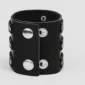 Bracelet Large en Cuir avec Boucles à Ardillon et Boutons Pression.