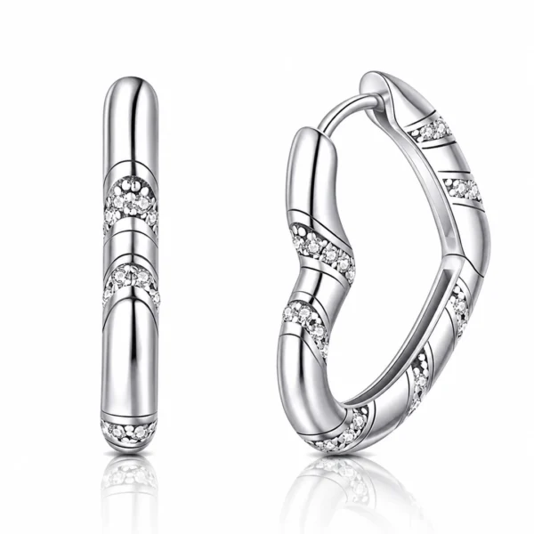Créoles Argent 925 en forme de Cœur avec Zirconiums Créoles Argent 925 en forme de Cœur avec Zirconiums.