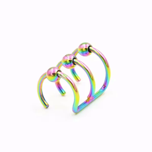 Faux Piercing Triple Anneau avec Billes en Acier 316L Multicolore PVD Faux Piercing Triple Anneau avec Billes en Acier 316L Multicolore PVD.