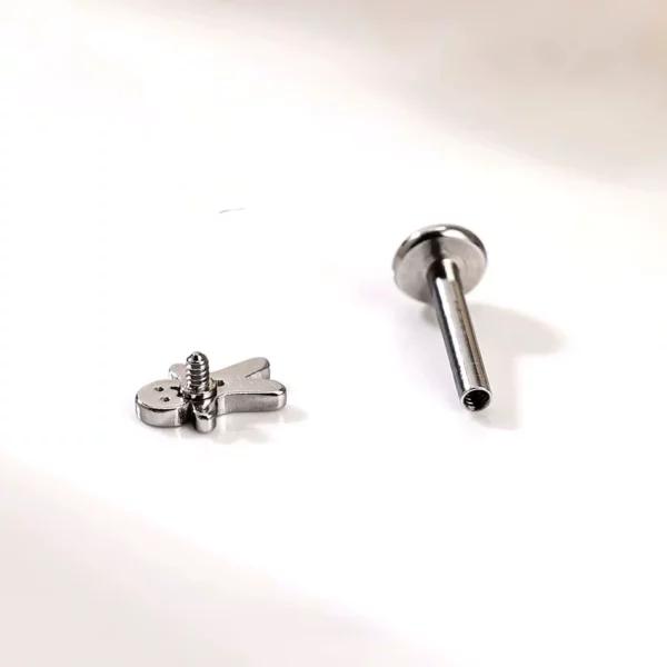 Piercing Labret Pain d’Épices en Acier (expo) Piercing Labret Pain d’Épices en Acier (expo).