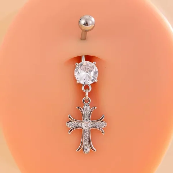 Piercing Nombril Croix Majestueuse Pavée de Zirconiums (présentation) Piercing Nombril Croix Majestueuse Pavée de Zirconiums (présentation).