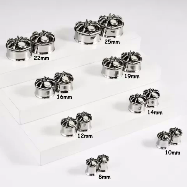 Écarteur Tunnel Araignée Sertie d'une Opale en Acier Chirurgical (dimensions) Écarteur Tunnel Araignée Sertie d'une Opale en Acier Chirurgical (dimensions).