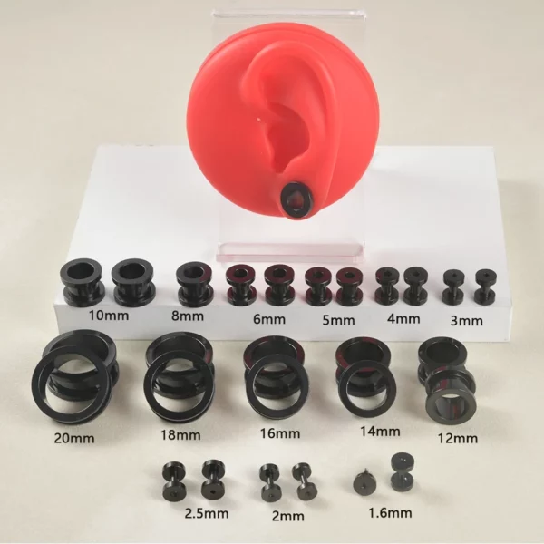 Écarteur Tunnel en Acier Chirurgical à Bague de Fixation Coulissante et Bordure Large (tailles noir) Écarteur Tunnel en Acier Chirurgical à Bague de Fixation Coulissante et Bordure Large (tailles noir).