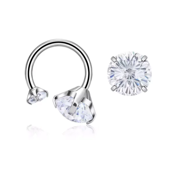 Piercing Fer à Cheval Titane à Embouts Zirconiums Asymétriques (variante blanc) Piercing Fer à Cheval Titane à Embouts Zirconiums Asymétriques (variante blanc).