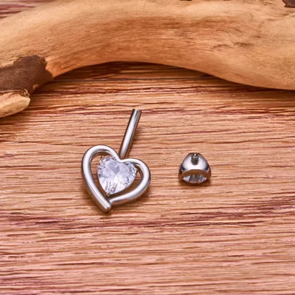 Piercing Nombril Double Cœur Titane et Zirconium (expo) Piercing Nombril Double Cœur Titane et Zirconium (expo).