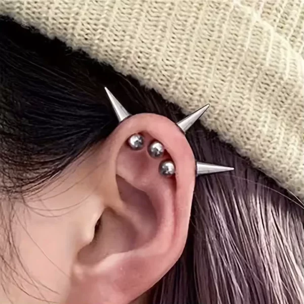 Piercing Punk Barbell à Spike pour Cartilage & Labret Central (sur cartilage) Piercing Punk Barbell à Spike pour Cartilage & Labret Central (sur cartilage).