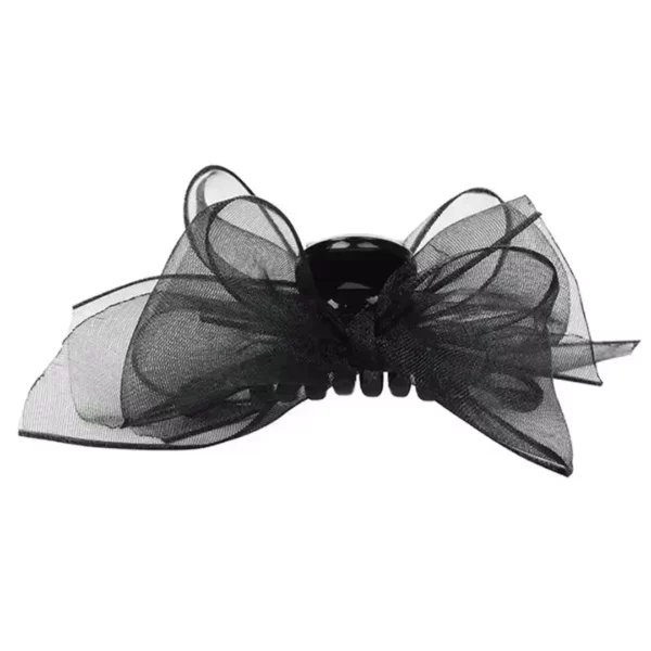 Pince à Cheveux Noire avec Nœuds Papillon Pince à Cheveux Noire avec Nœuds Papillon.