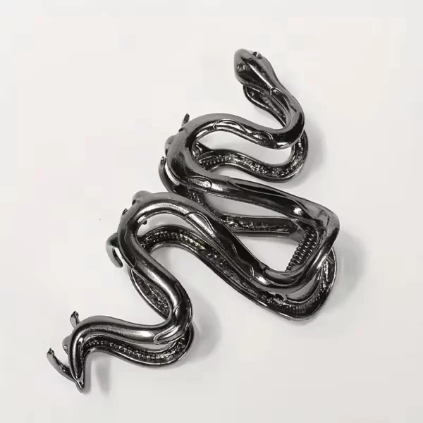Pince à Cheveux Serpent Noir Grand Format 11 cm Pince à Cheveux Serpent Noir Grand Format 11 cm.