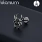Piercing Araignée Labret Titane à Zirconium Griffé Noir.