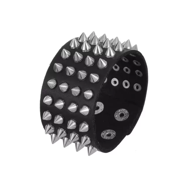 Bracelet clouté cuir véritable - variante 4 rangées de clous Bracelet clouté cuir véritable - variante 4 rangées de clous.