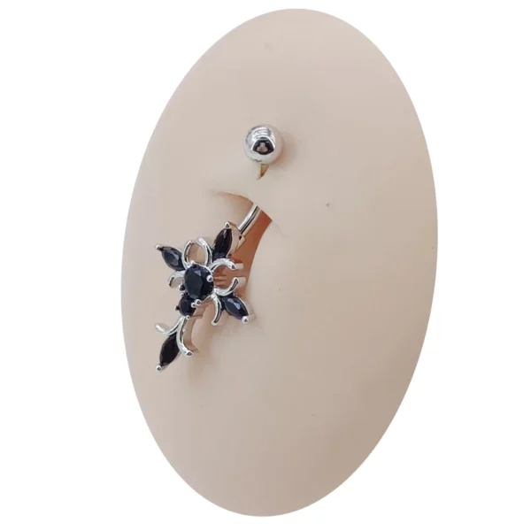 Piercing Croix Sertie de Zircons Noirs sur Nombril Piercing Croix Sertie de Zircons Noirs sur Nombril.