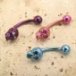 Piercing Nombril en Titane à Tête de Mort aux Yeux Sertis de Zircons.