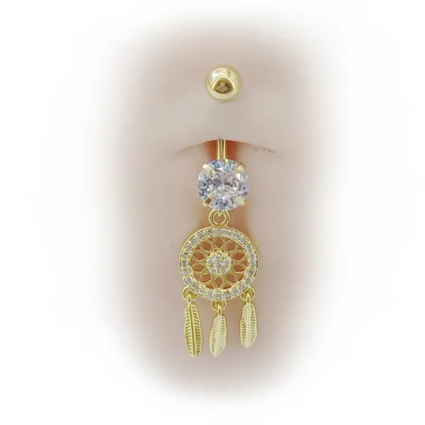 Nombril avec un Piercing Attrape-Rêves Scintillant en Titane Nombril avec un Piercing Attrape-Rêves Scintillant en Titane.