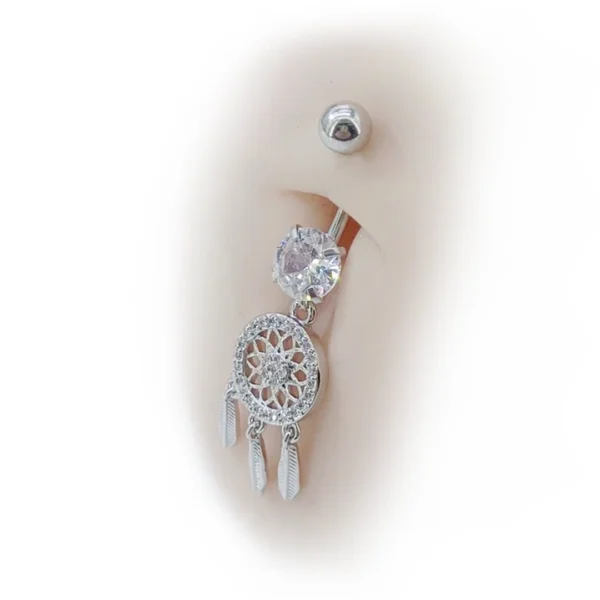Piercing Attrape-Rêves Scintillant en Titane ASTM-F136 sur Nombril Piercing Attrape-Rêves Scintillant en Titane ASTM-F136 sur Nombril.