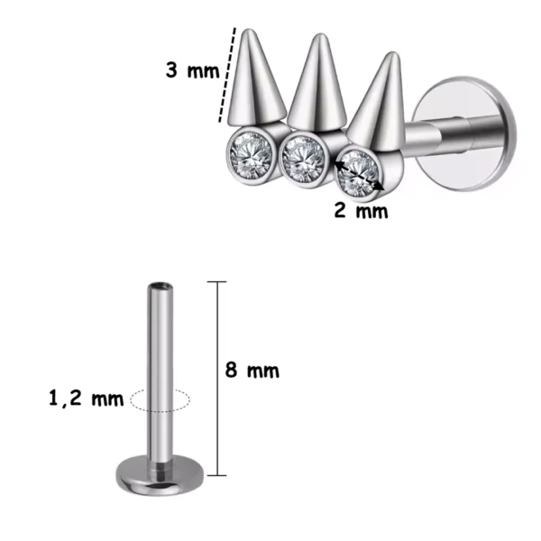 Piercing Labret Titane Spikes et Zircons Sertis (variante 8 mm) Piercing Labret Titane Spikes et Zircons Sertis (variante 8 mm).