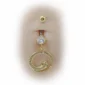 Nombril Femme avec Piercing Serpent Doré en Cercle et Zircons Rouges.