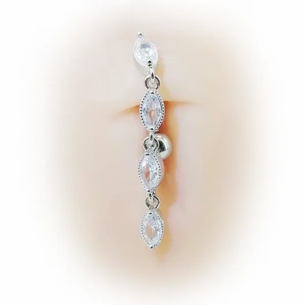 Piercing Inversé Titane Cascade de Zircons Marquise sur Nombril Femme Piercing Inversé Titane Cascade de Zircons Marquise sur Nombril Femme.