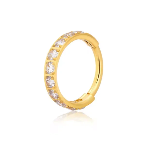 Anneau Clicker en Titane Serti de Zirconiums - 8 à 12 mm (variante anodisé doré) Anneau Clicker en Titane Serti de Zirconiums - 8 à 12 mm (variante anodisé doré).