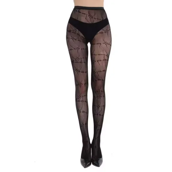 Femme Punk en Collants Résille Noirs à Motif Barbelés Femme Punk en Collants Résille Noirs à Motif Barbelés.