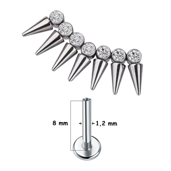 Piercing Labret Titane ASTM-F136 à 7 Pointes Coniques sur Base Sertie (variante 8 mm) Piercing Labret Titane ASTM-F136 à 7 Pointes Coniques sur Base Sertie (variante 8 mm).