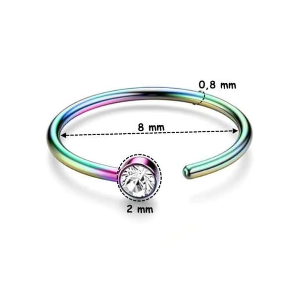 Piercing Nostril Anneau de Narine Ouvert Épaisseur 0,8 mm en Acier 316L à Zircon 2 mm (variante multicolore PVD) Piercing Nostril Anneau de Narine Ouvert Épaisseur 0,8 mm en Acier 316L à Zircon 2 mm (variante multicolore PVD).