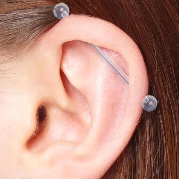 Piercing Retainer Barbell Droit en Bioflex® 14G 34 mm sur Industriel (cartilage) Piercing Retainer Barbell Droit en Bioflex® 14G 34 mm sur Industriel (cartilage).