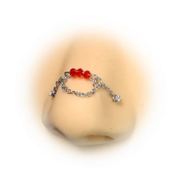Chaîne de Nez sur Double Nostril avec Perles Rouges 31-49 mm Chaîne de Nez sur Double Nostril avec Perles Rouges 31-49 mm.
