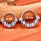 Piercing Clicker Titane orné de Zirconiums Taille Marquise Bicolores - Bleu Azur & Cristal Clair 8-10 mm.