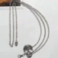 Ceinture Chaîne de Taille Tête de Mort Cloutée Acier 316L avec Mousqueton.