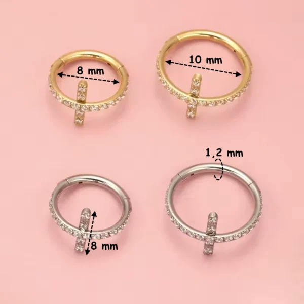 Piercing Anneau Clicker Titane Croix Pavée de Zircons (dimensions) Piercing Anneau Clicker Titane Croix Pavée de Zircons (dimensions).