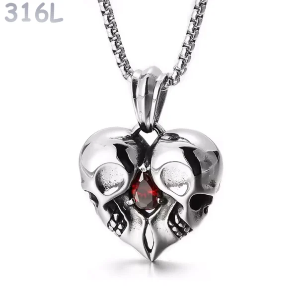 Collier Double Tête de Mort Cœur Acier 316L Collier Double Tête de Mort Cœur Acier 316L.